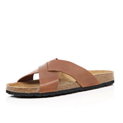 Brown leather cross-strap sandals